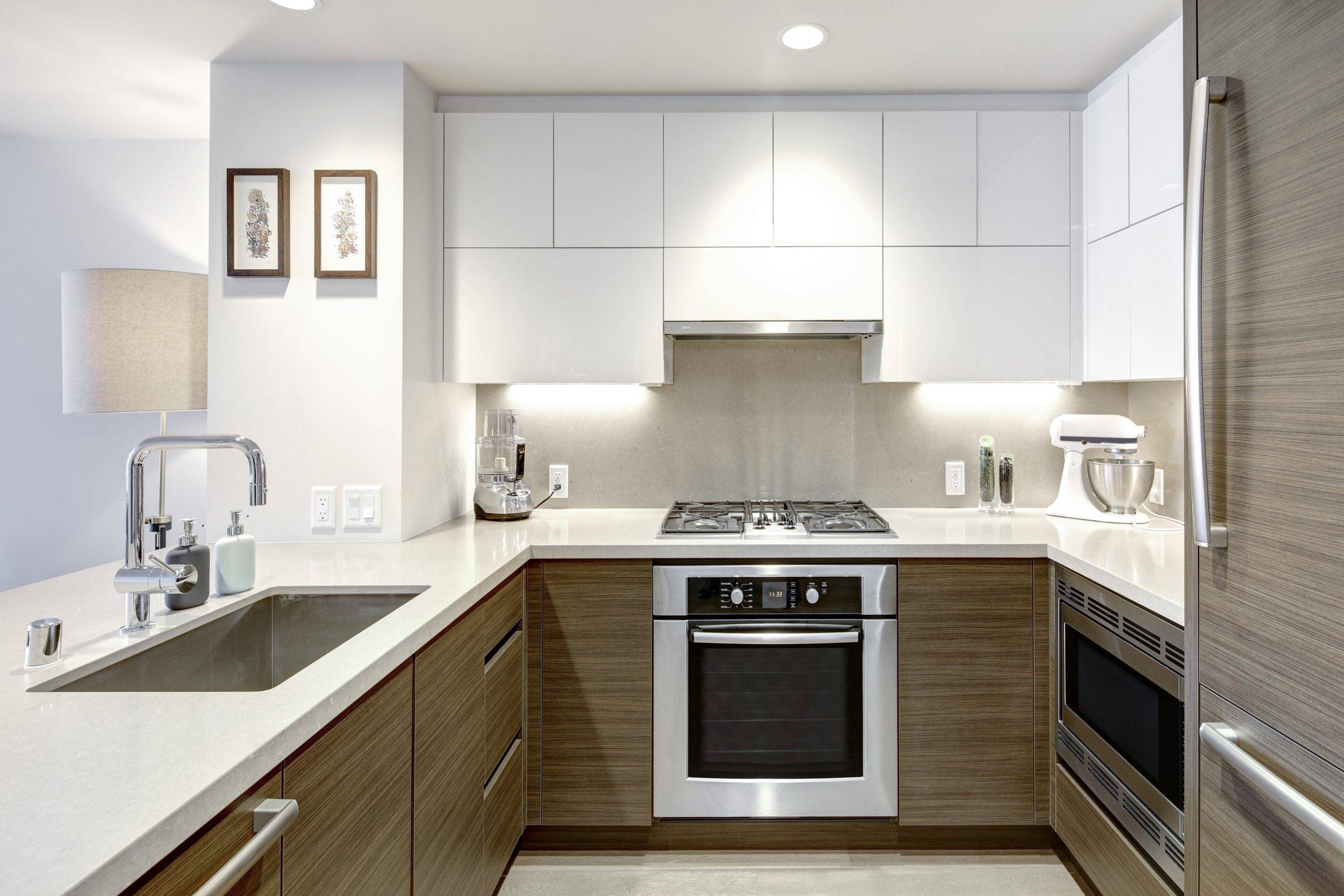 Modern custom kitchen cabinets with integrated handles by Blue Heron in Portsmouth, NH