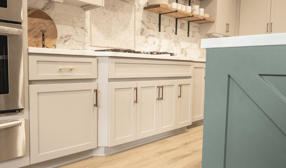 Shaker-style custom kitchen cabinets with quartz countertops by Blue Heron in Boston, MA